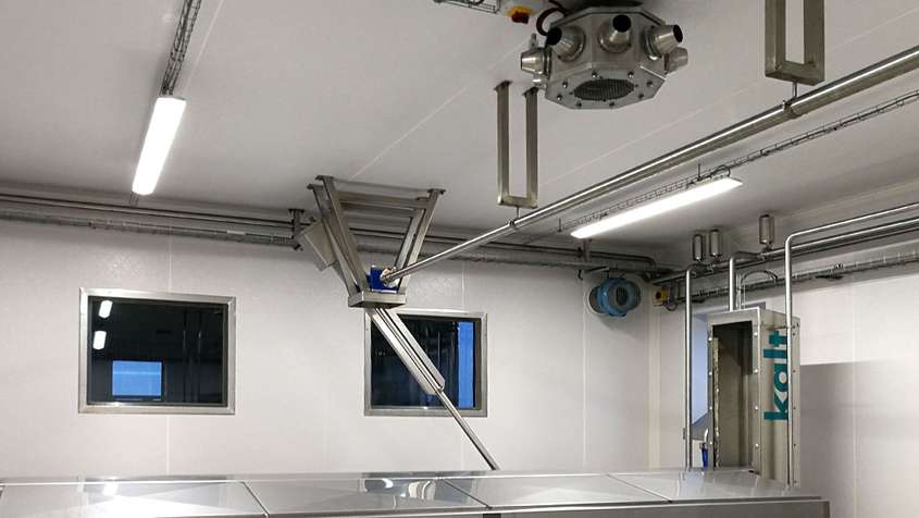 A white room with technical equipment made from stainless steel